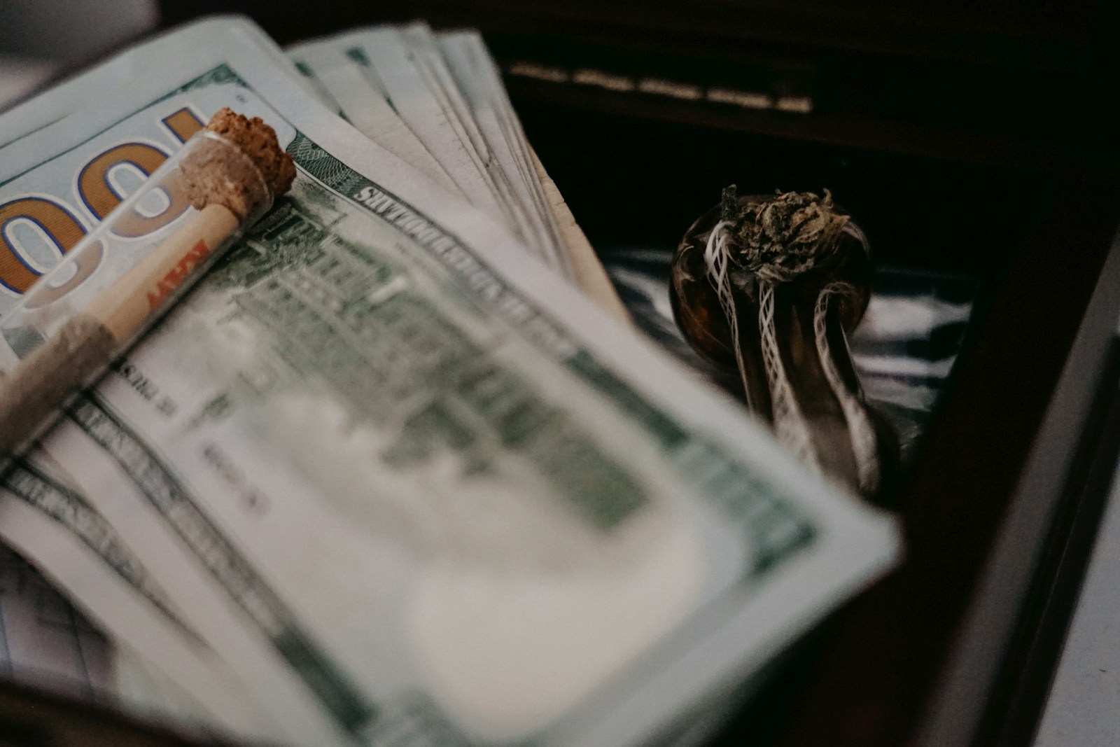 a pile of money sitting on top of a table